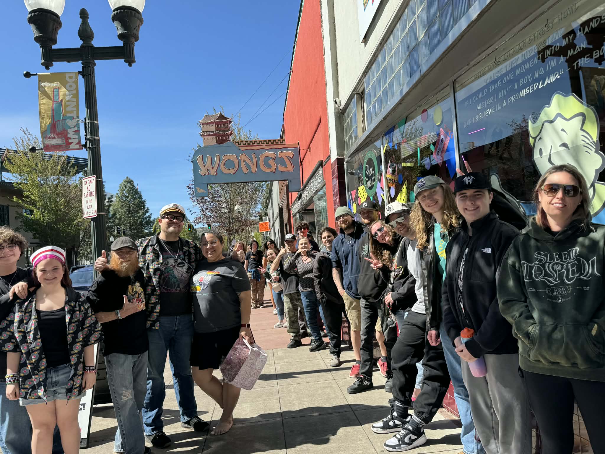 Crowd of people in front of store